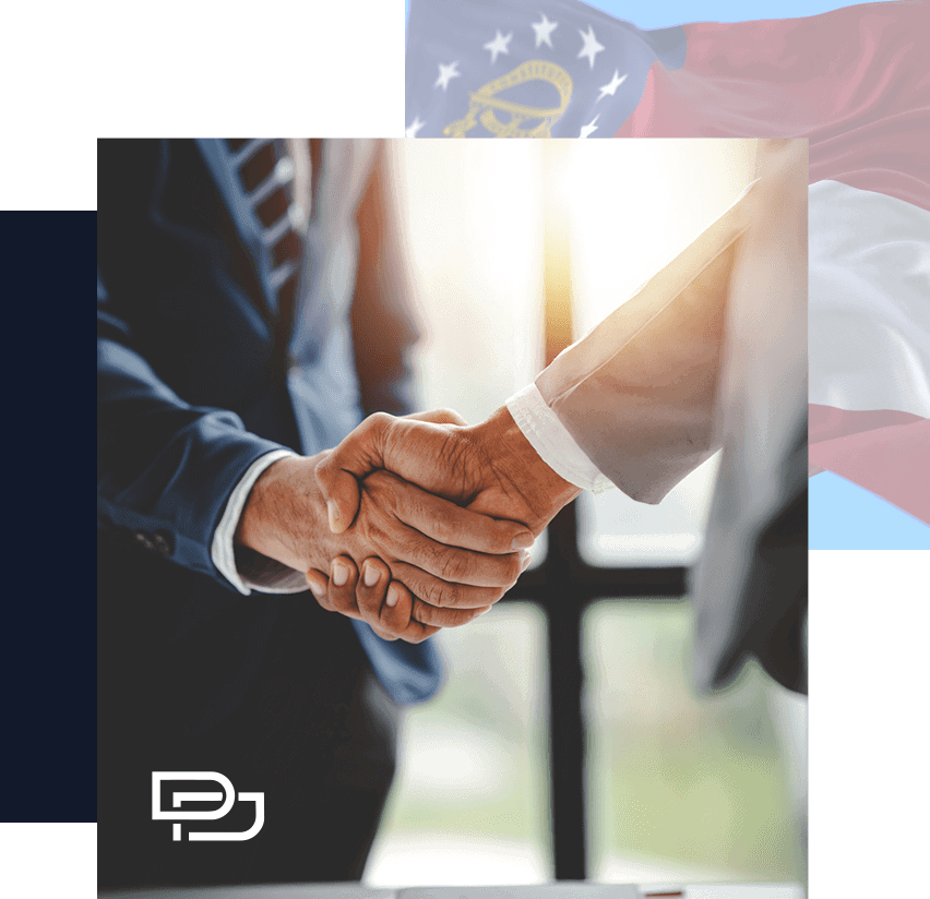 Two people in business attire shaking hands in front of a window, with part of a flag and a white logo visible in the image corners.